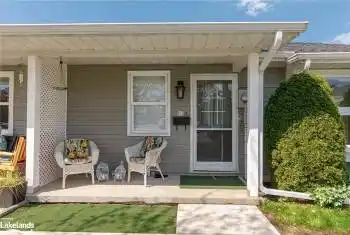 View of exterior entry featuring a porch