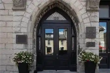 Property entrance featuring french doors